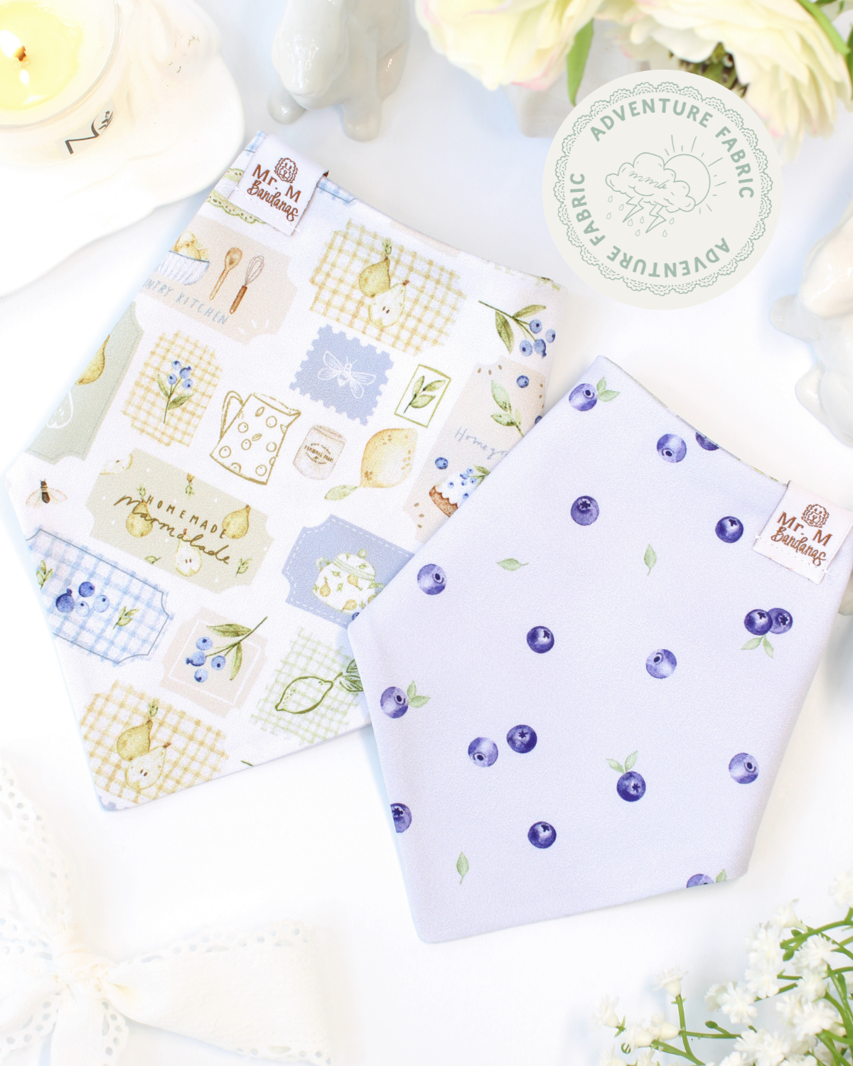 dog bandanas with patterns on a white surface with flowers.