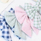 Set of collar bows on a white surface