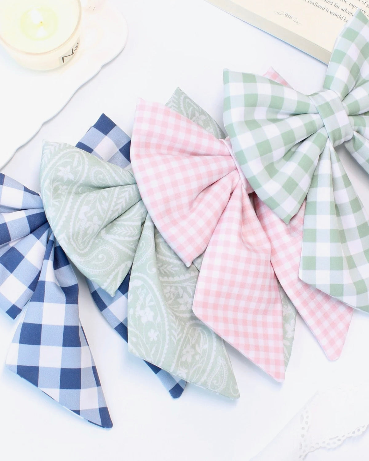 Set of collar bows on a white surface